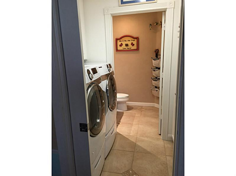 1943 Frederick Small Road, Unit 1943 Jupiter, FL 33458 - Photo 13 of 34 Laundry Room