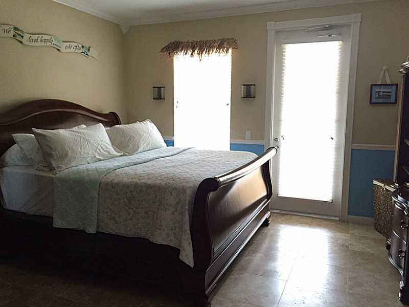 1943 Frederick Small Road, Unit 1943 Jupiter, FL 33458 - Photo 17 of 34 Master Bedroom