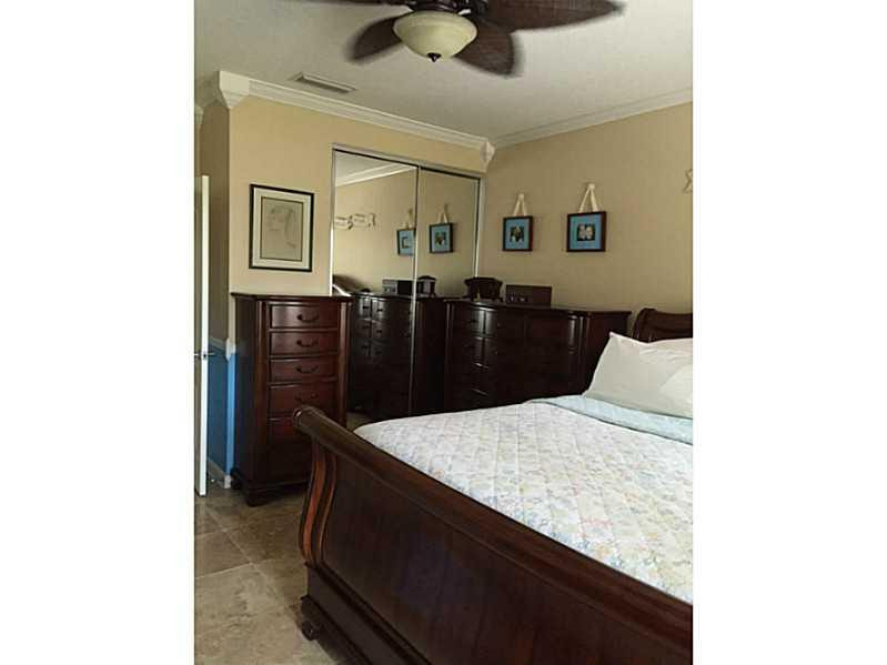 1943 Frederick Small Road, Unit 1943 Jupiter, FL 33458 - Photo 18 of 34 Master Bedroom