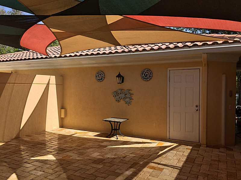 1943 Frederick Small Road, Unit 1943 Jupiter, FL 33458 - Photo 30 of 34 Patio/Deck