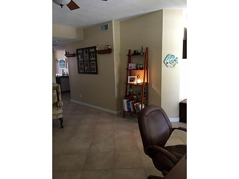 1943 Frederick Small Road, Unit 1943 Jupiter, FL 33458 - Photo 5 of 34 Den/Family/Great Room