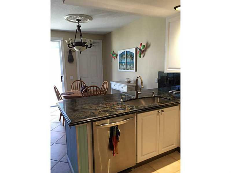 1943 Frederick Small Road, Unit 1943 Jupiter, FL 33458 - Photo 6 of 34 Den/Family/Great Room
