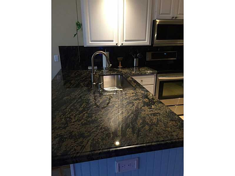 1943 Frederick Small Road, Unit 1943 Jupiter, FL 33458 - Photo 8 of 34 Kitchen