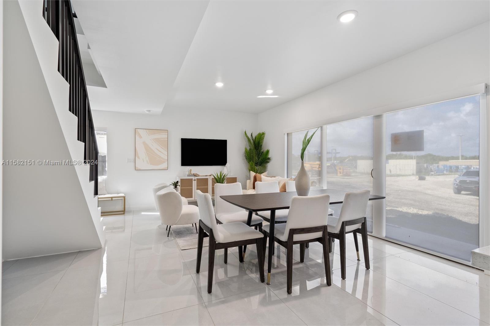 214 Northwest 13th Street Florida City, FL 33034 - Photo 2 of 31 a view of a dining room with furniture