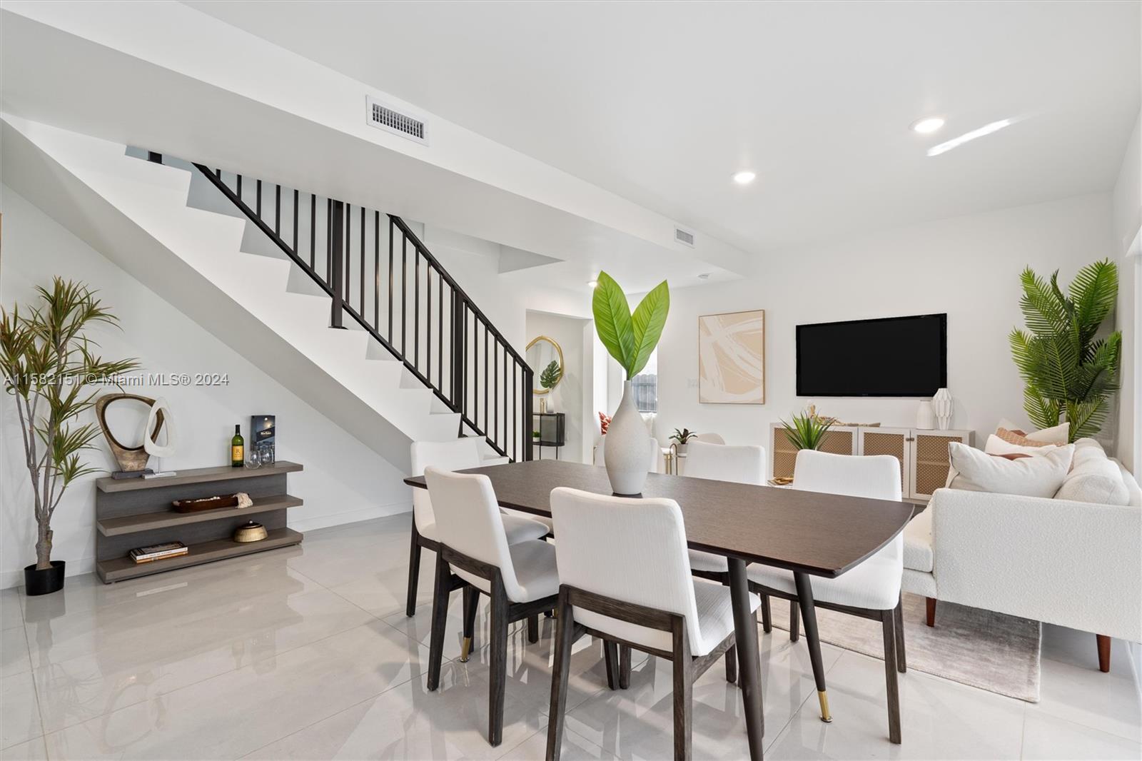 214 Northwest 13th Street Florida City, FL 33034 - Photo 4 of 31 a view of a livingroom with furniture window and wooden floor