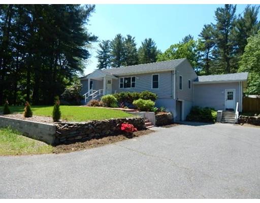 296 Great Road Shirley, MA 01464 - Photo 4 of 22 a front view of a house with a yard and outdoor seating