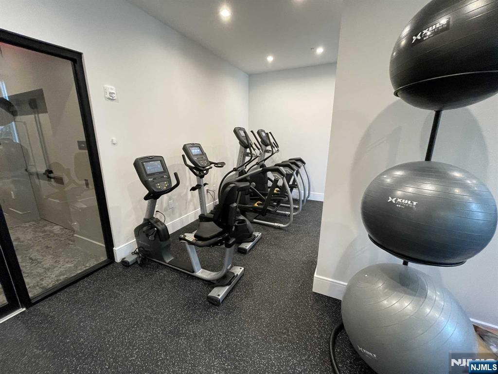 470 Main Street, Unit 703 Fort Lee, NJ 07024 - Photo 18 of 19 a view of a room with gym equipment