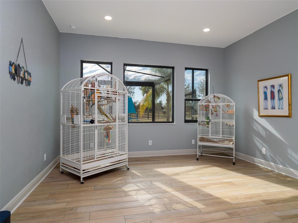 11920 Southeast 22nd Ave Road Ocala, FL 34480 - Photo 16 of 31 a view of livingroom with furniture and windows