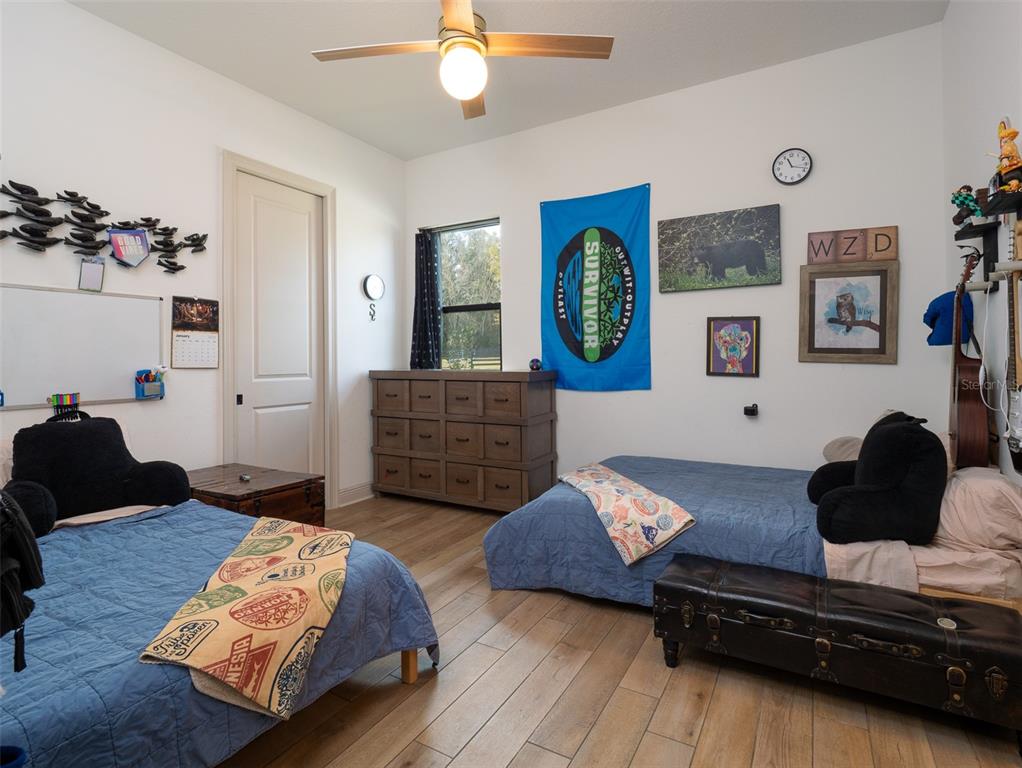 11920 Southeast 22nd Ave Road Ocala, FL 34480 - Photo 18 of 31 a living room with furniture and a window