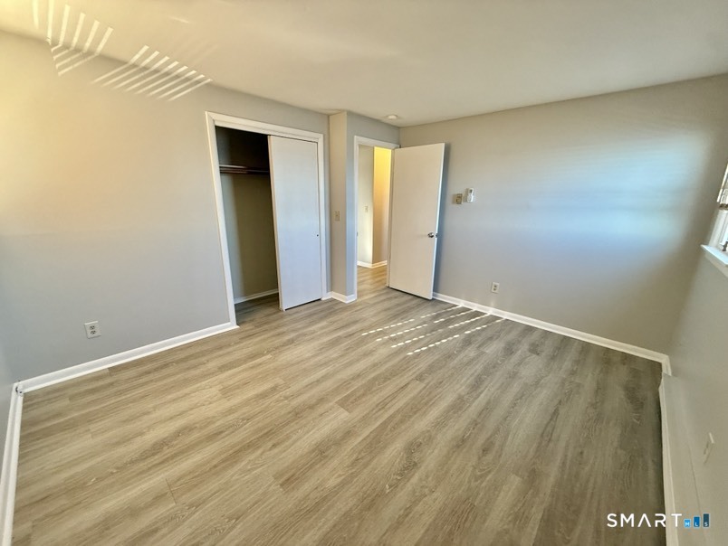 3 Bayview Place, Unit 2 West Haven, CT 06516 - Photo 11 of 19 a view of an empty room and window