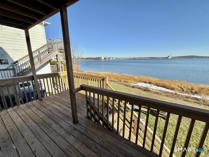 3 Bayview Place, Unit 2 West Haven, CT 06516 - Photo 5 of 19 a view of a balcony with wooden floor and outdoor space