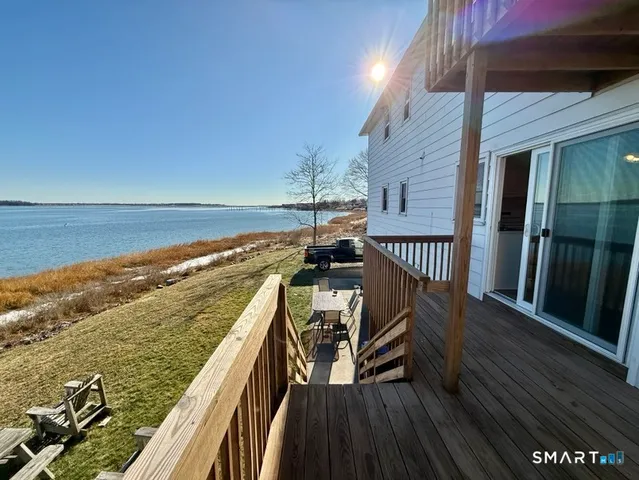 a view of roof deck with patio