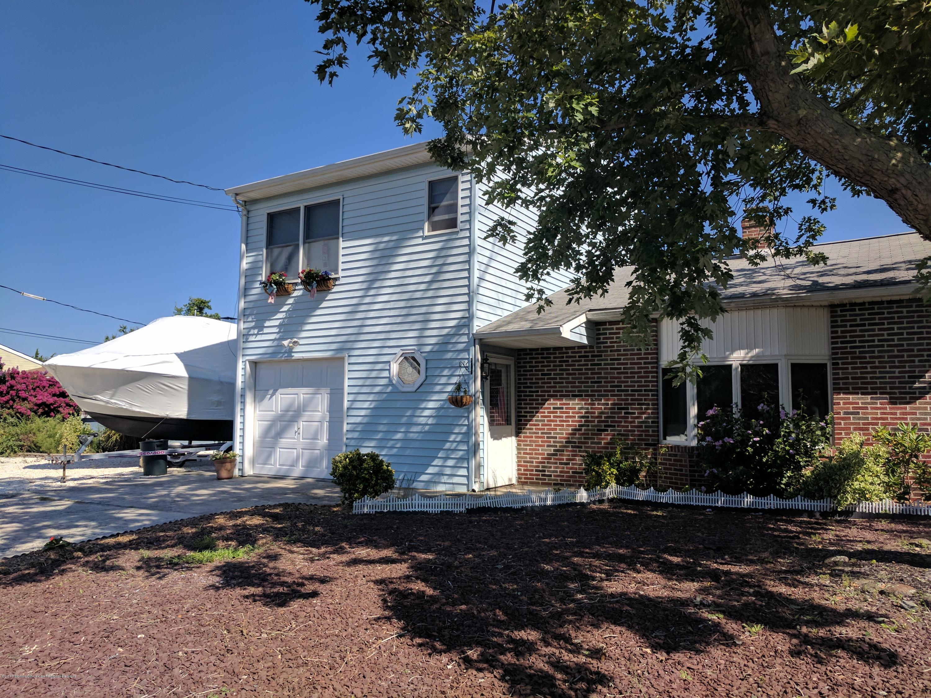 806 Harbor Road Forked River, NJ 08731 - Photo 6 of 12 a front view of a house with garden