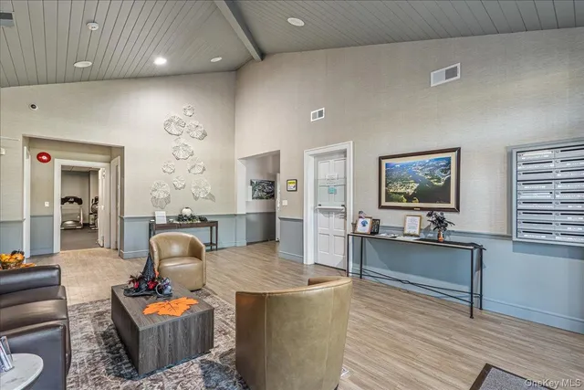 a living room with furniture and a table