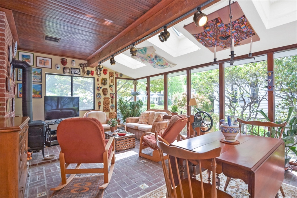 21 Stevens Road Needham, MA 02492 - Photo 12 of 26 a living room with furniture and a large window