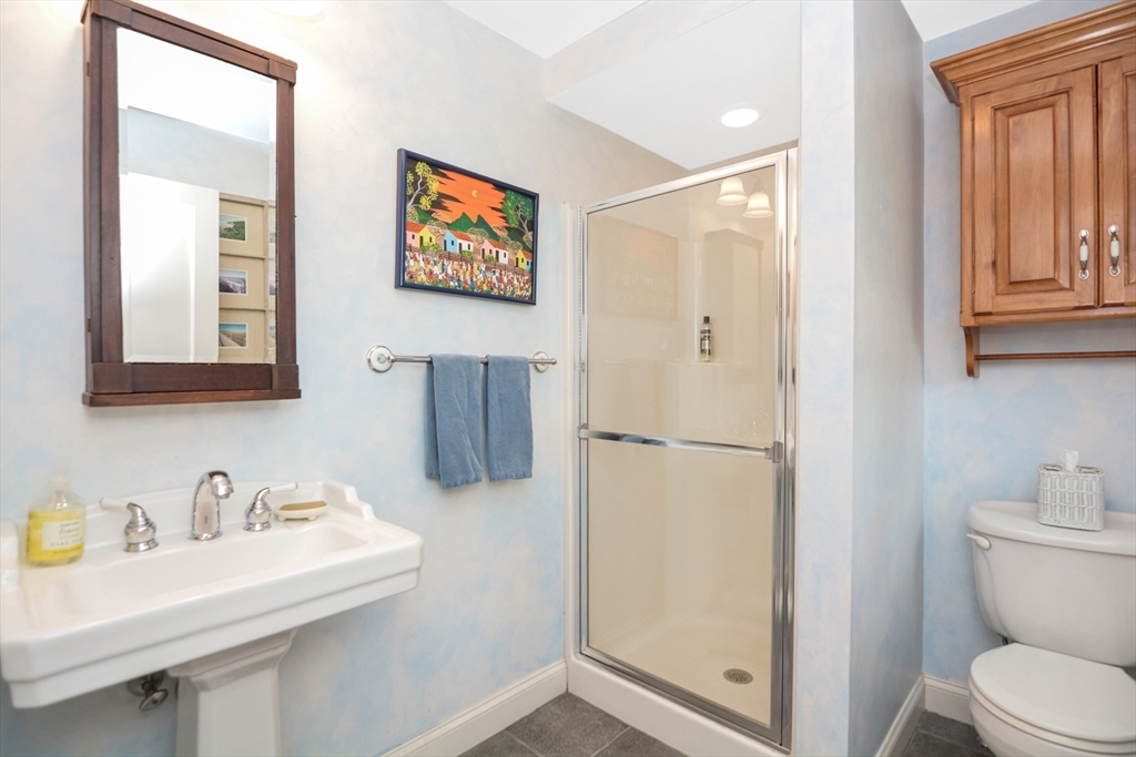 21 Stevens Road Needham, MA 02492 - Photo 13 of 26 a bathroom with a sink toilet and vanity