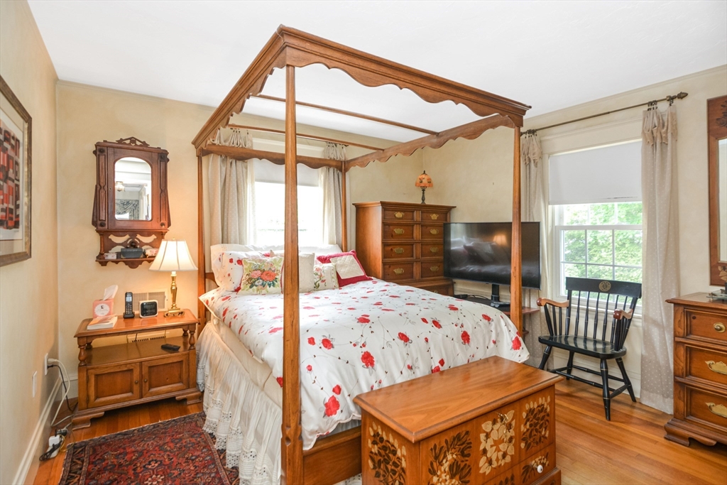 21 Stevens Road Needham, MA 02492 - Photo 15 of 26 a bedroom with a bed and a window