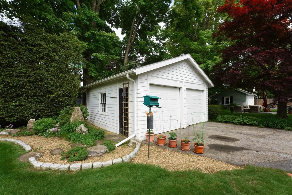 21 Stevens Road Needham, MA 02492 - Photo 26 of 26 a view of a house with yard and a garden