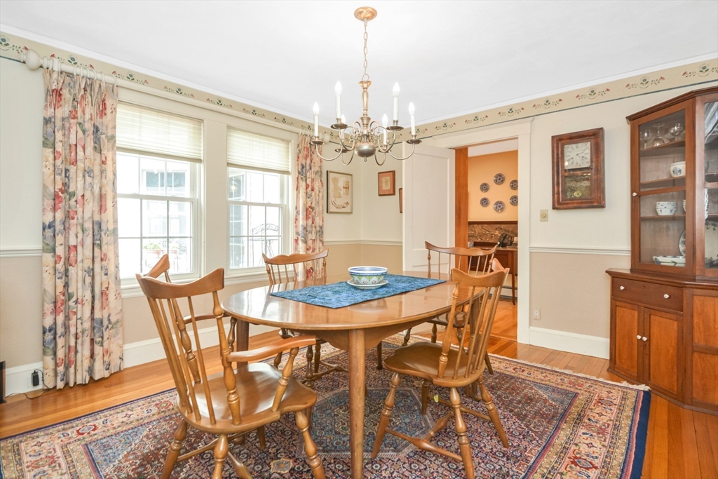21 Stevens Road Needham, MA 02492 - Photo 10 of 26 a view of a dining room with furniture and chandelier
