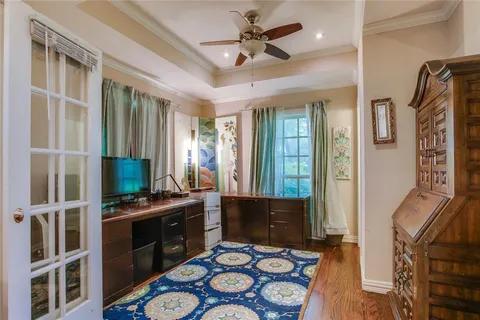 a view of kitchen island with furniture and wooden floor