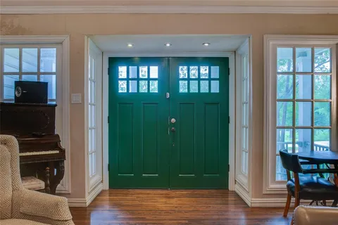 a view of livingroom with hardwood floor and hallway