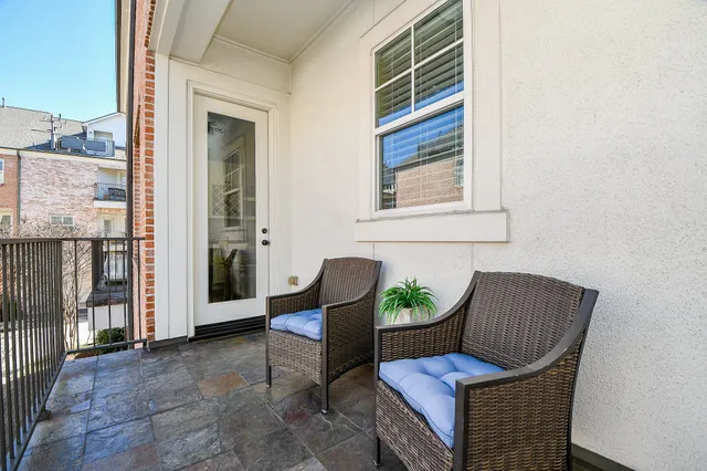 a view of chair and glass door
