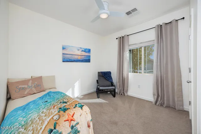 a bedroom with a bed and furniture