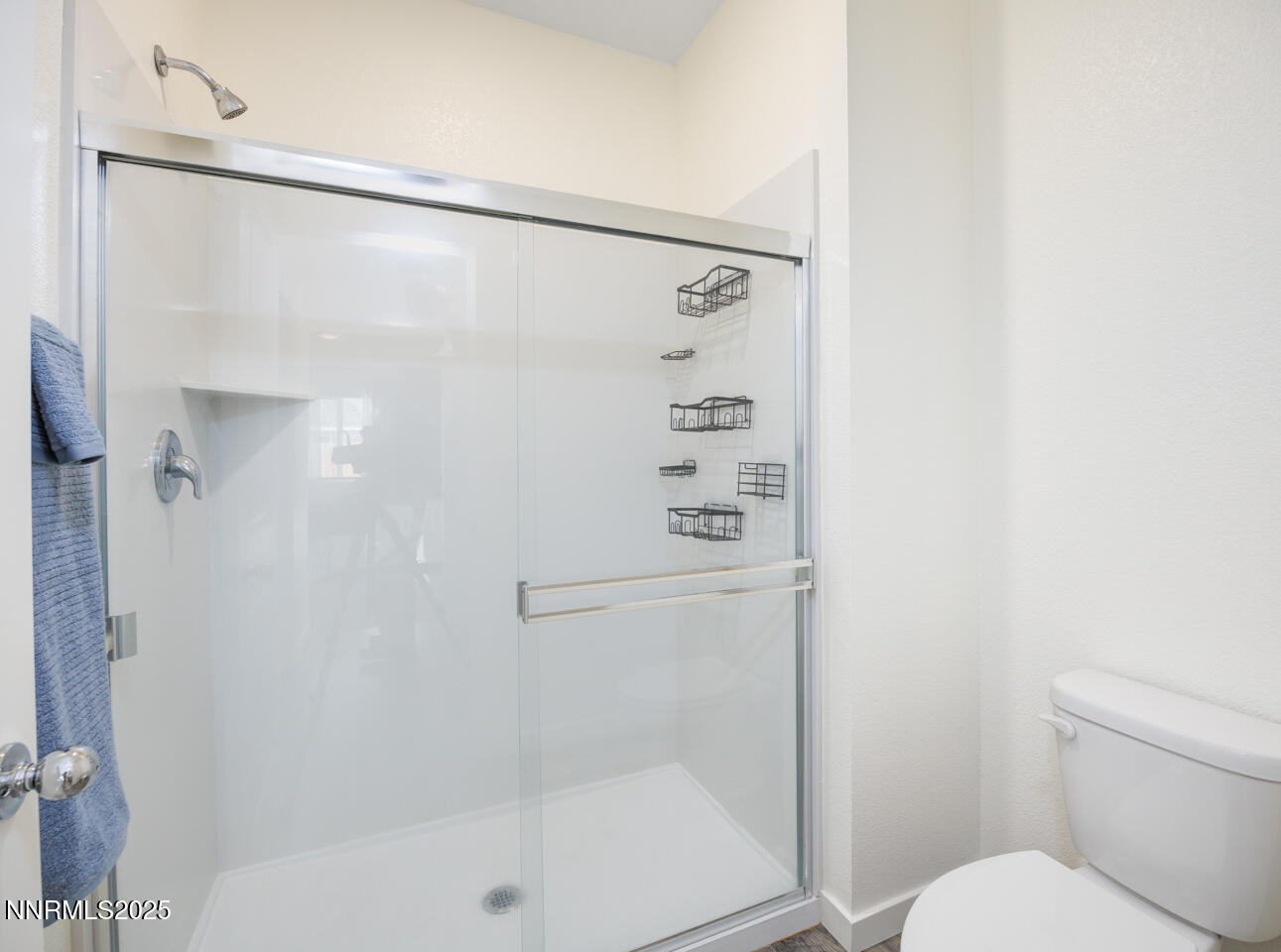 775 Karry Way Fallon, NV 89406 - Photo 16 of 26 a bathroom with a shower and a toilet
