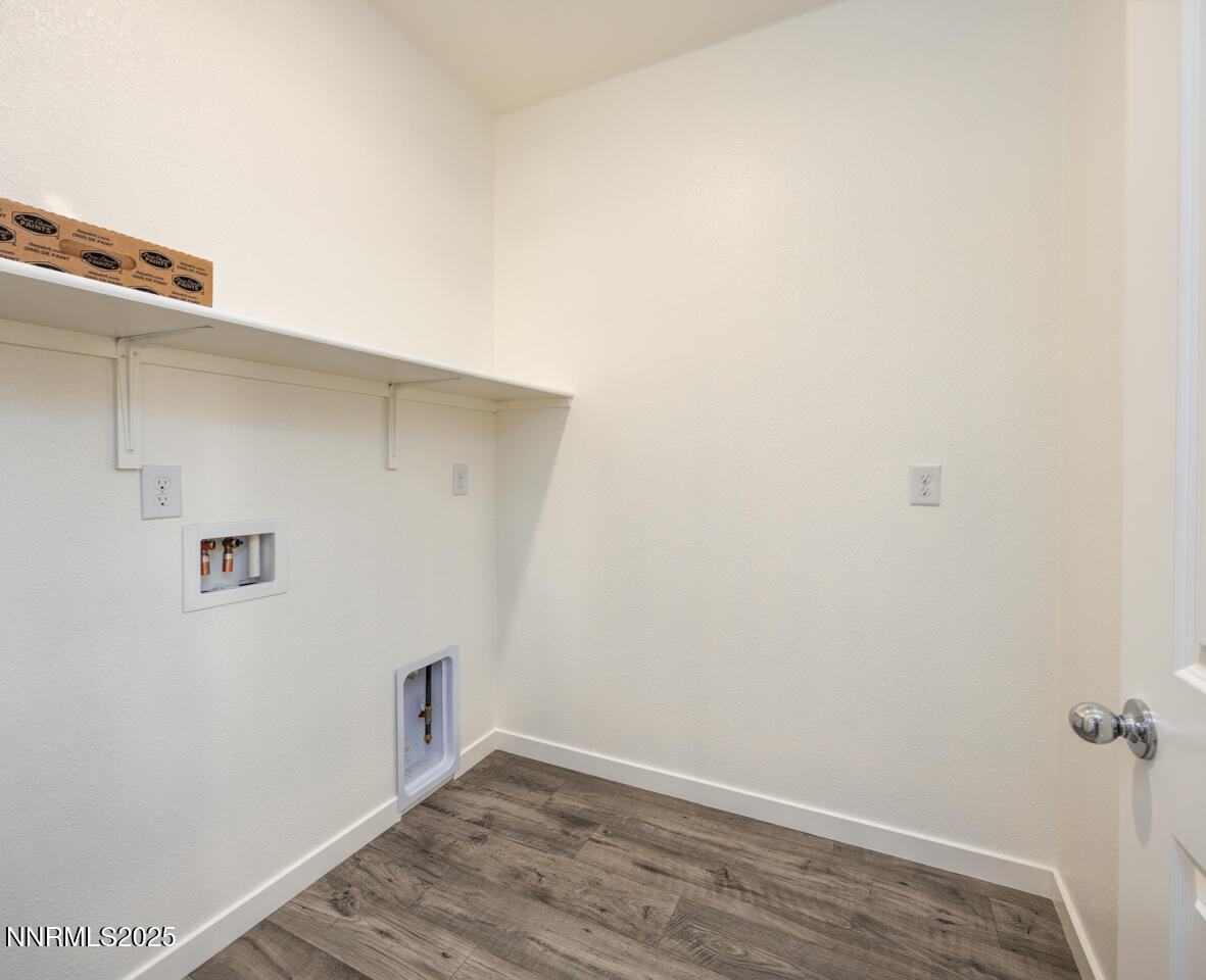 775 Karry Way Fallon, NV 89406 - Photo 18 of 26 a view of a room with wooden floor