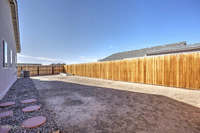 a view of a backyard of a house