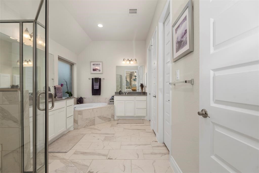 28196 Knight Peak Drive Spring, TX 77386 - Photo 13 of 31 a large white room with a large mirror and shower