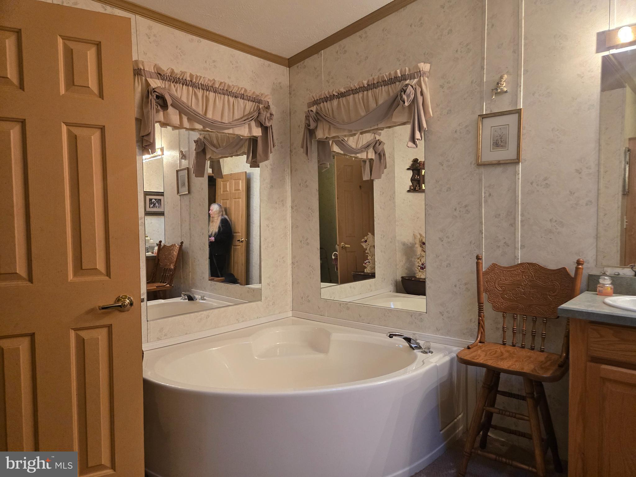 27 Behm Lane Colora, MD 21917 - Photo 12 of 25 a bath tub sitting next to a bathroom sink