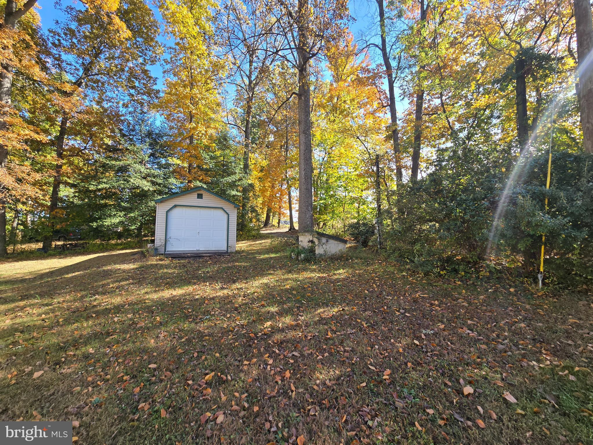27 Behm Lane Colora, MD 21917 - Photo 19 of 25 a backyard of a house with trees and houses