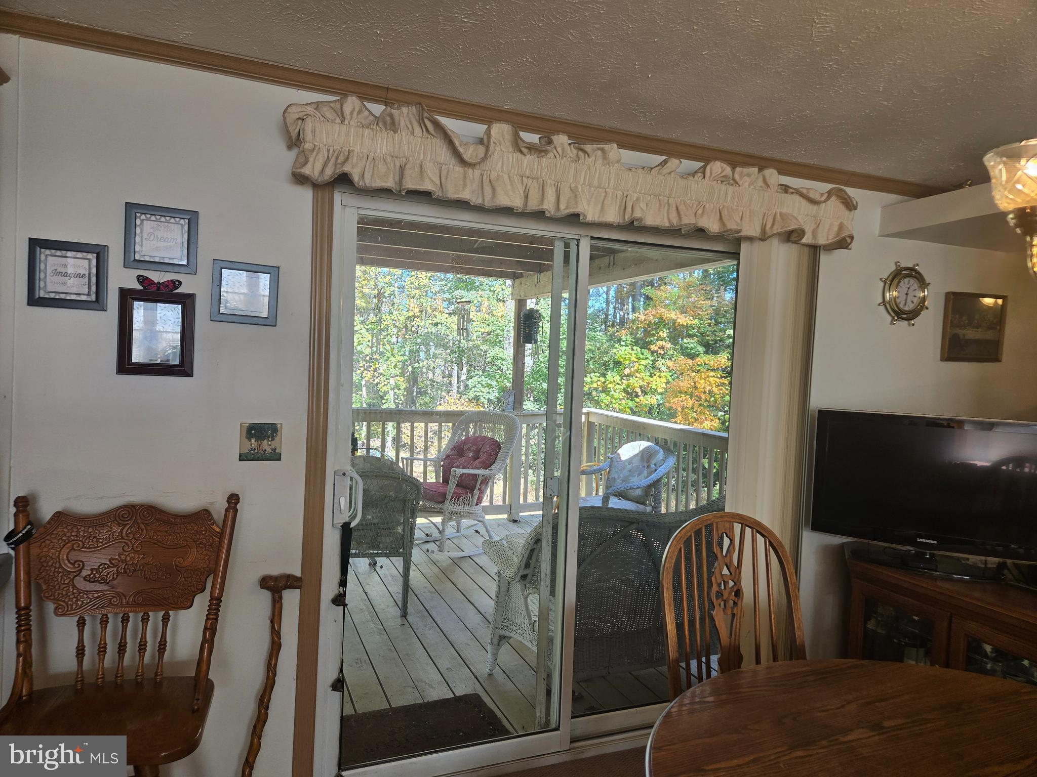 27 Behm Lane Colora, MD 21917 - Photo 23 of 25 a living room with furniture and a flat screen tv
