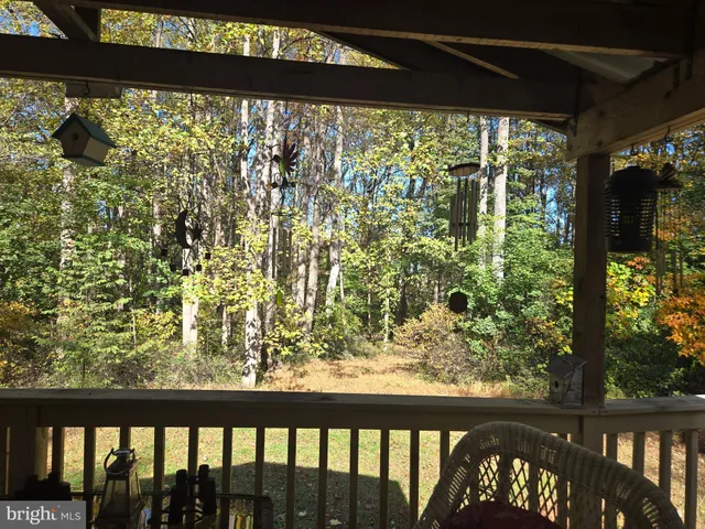 a view of a glass door with a balcony