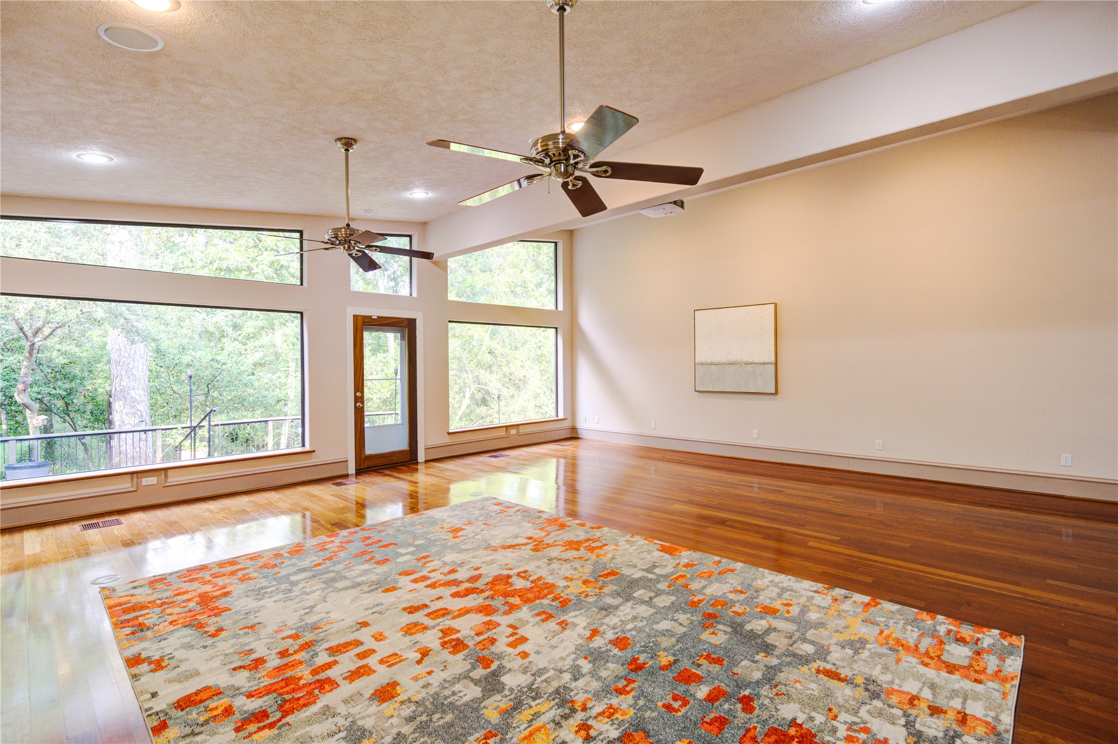 6 Gessner Road Houston, TX 77024 - Photo 11 of 49 Room to add a sitting area by the windows overlooking the deck and lush back yard.