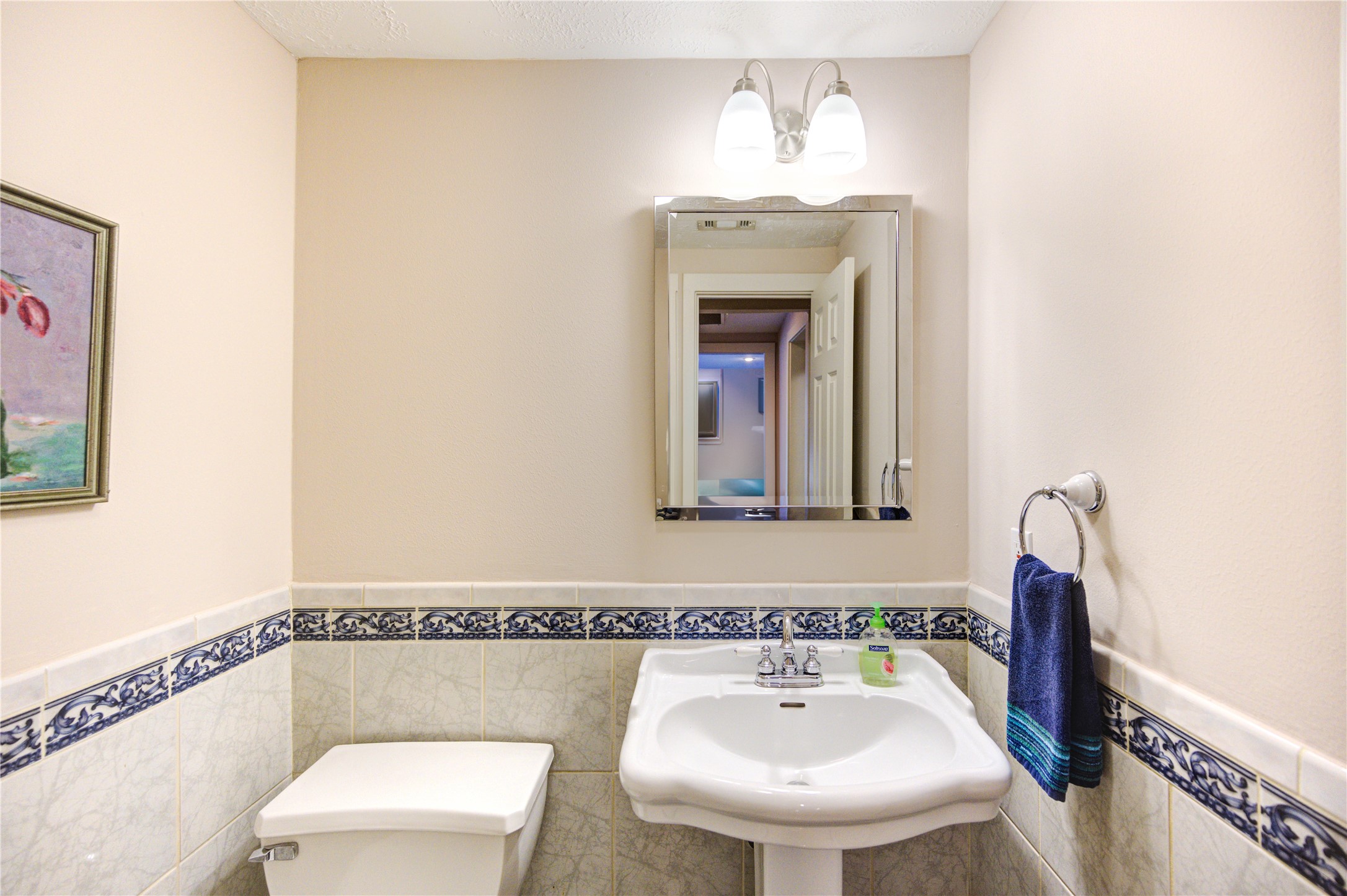 6 Gessner Road Houston, TX 77024 - Photo 18 of 49 a bathroom with a sink and a mirror