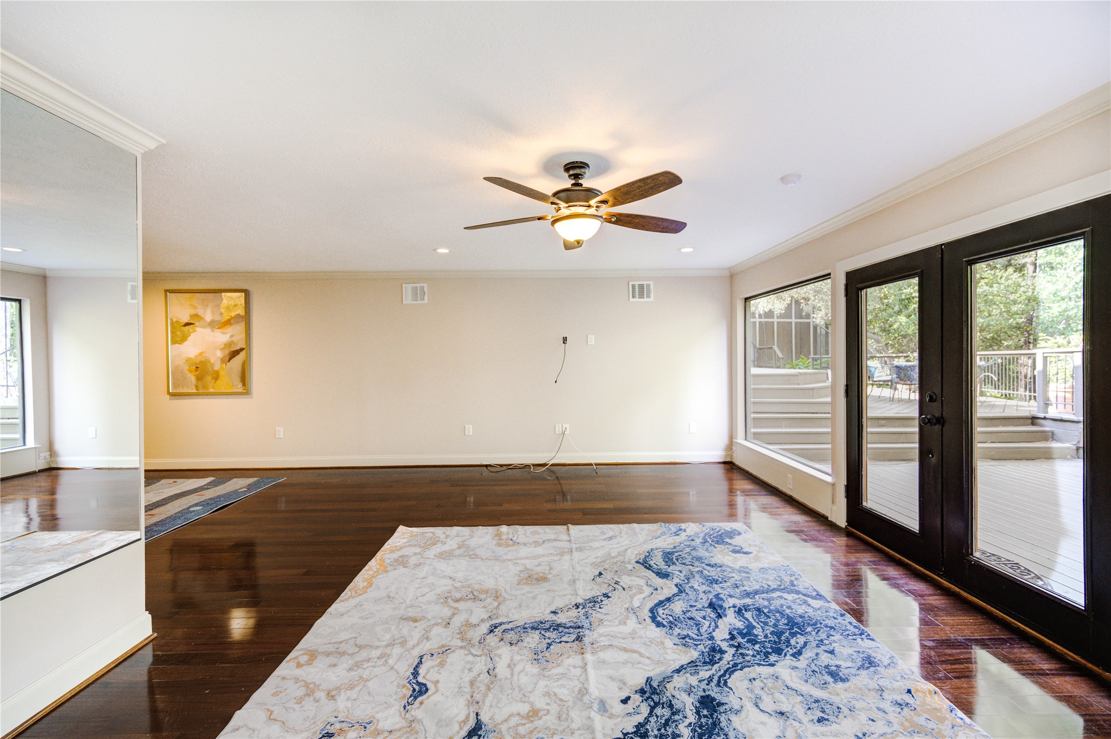 6 Gessner Road Houston, TX 77024 - Photo 25 of 49 a view of a room with a window and wooden floor