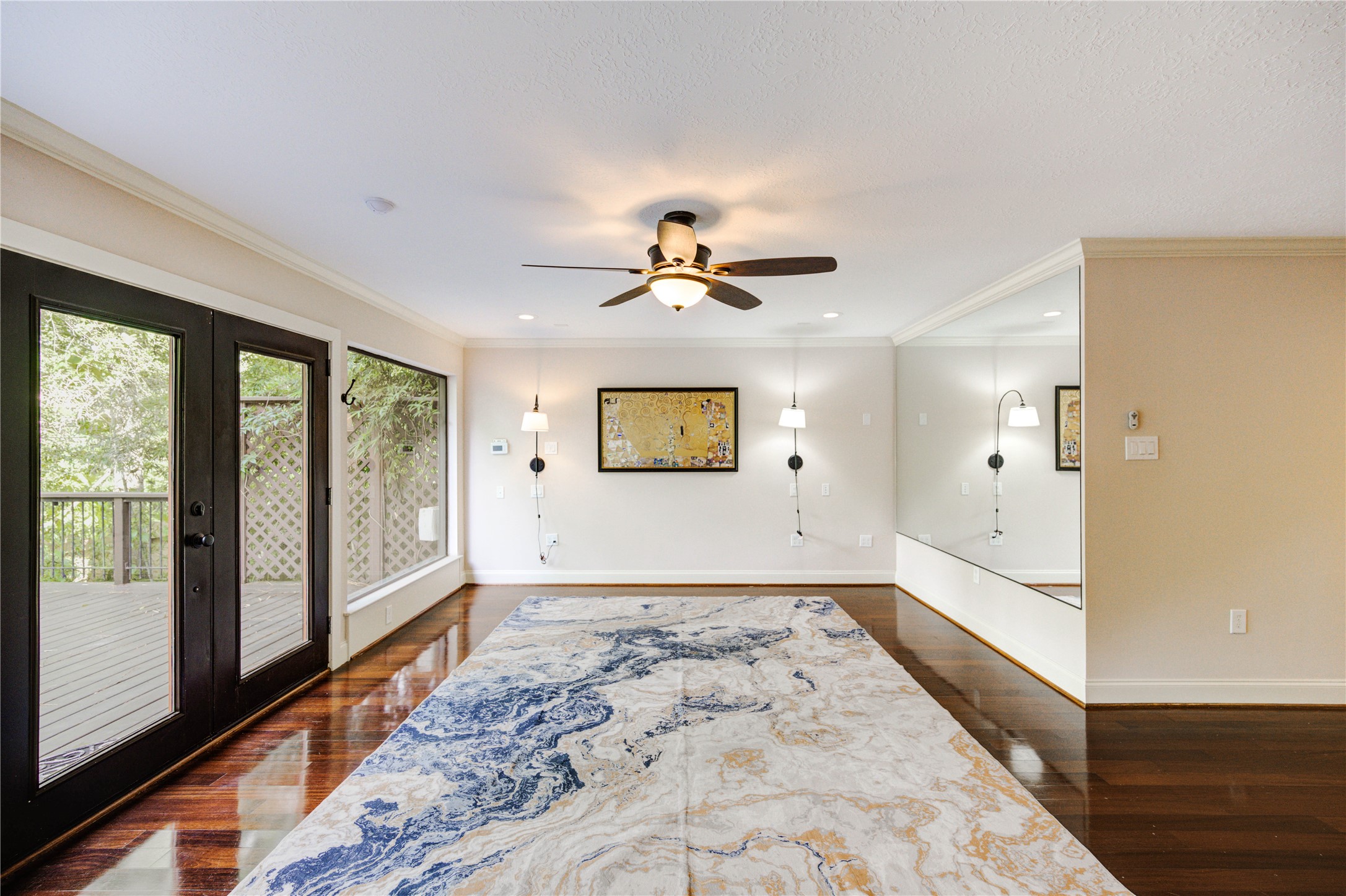 6 Gessner Road Houston, TX 77024 - Photo 26 of 49 Beautiful windows make this room light and bright. Nice accents lights are placed perfect for your king bed.