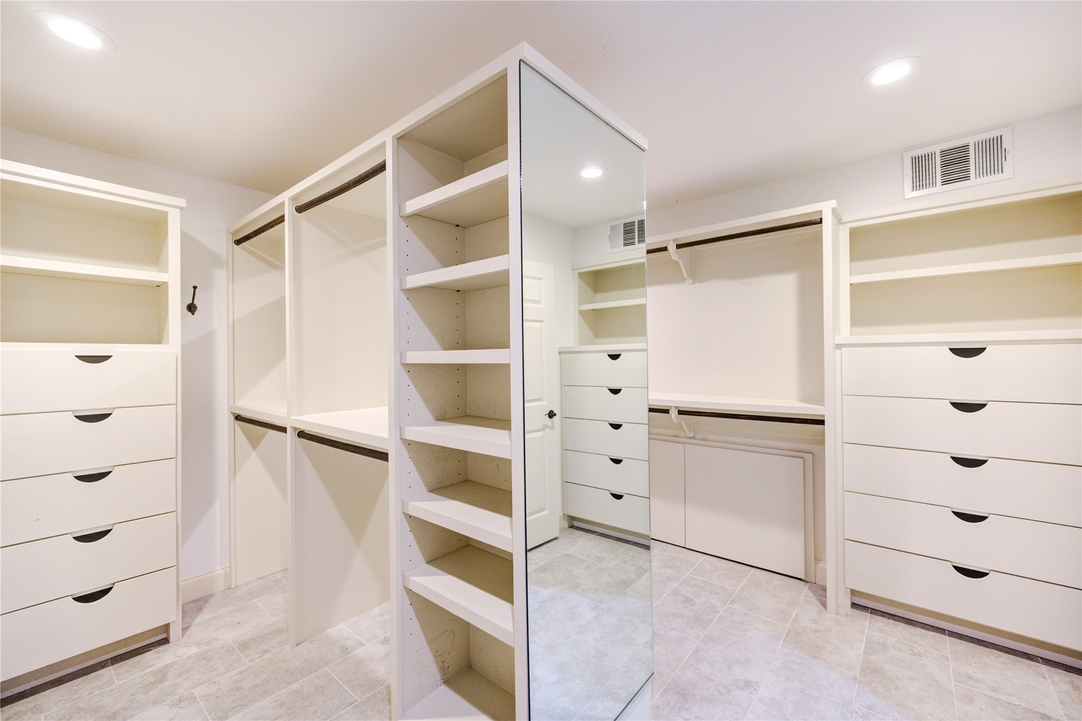 6 Gessner Road Houston, TX 77024 - Photo 29 of 49 Three sets of built in drawers and lots of shoe racks were added for convenience.