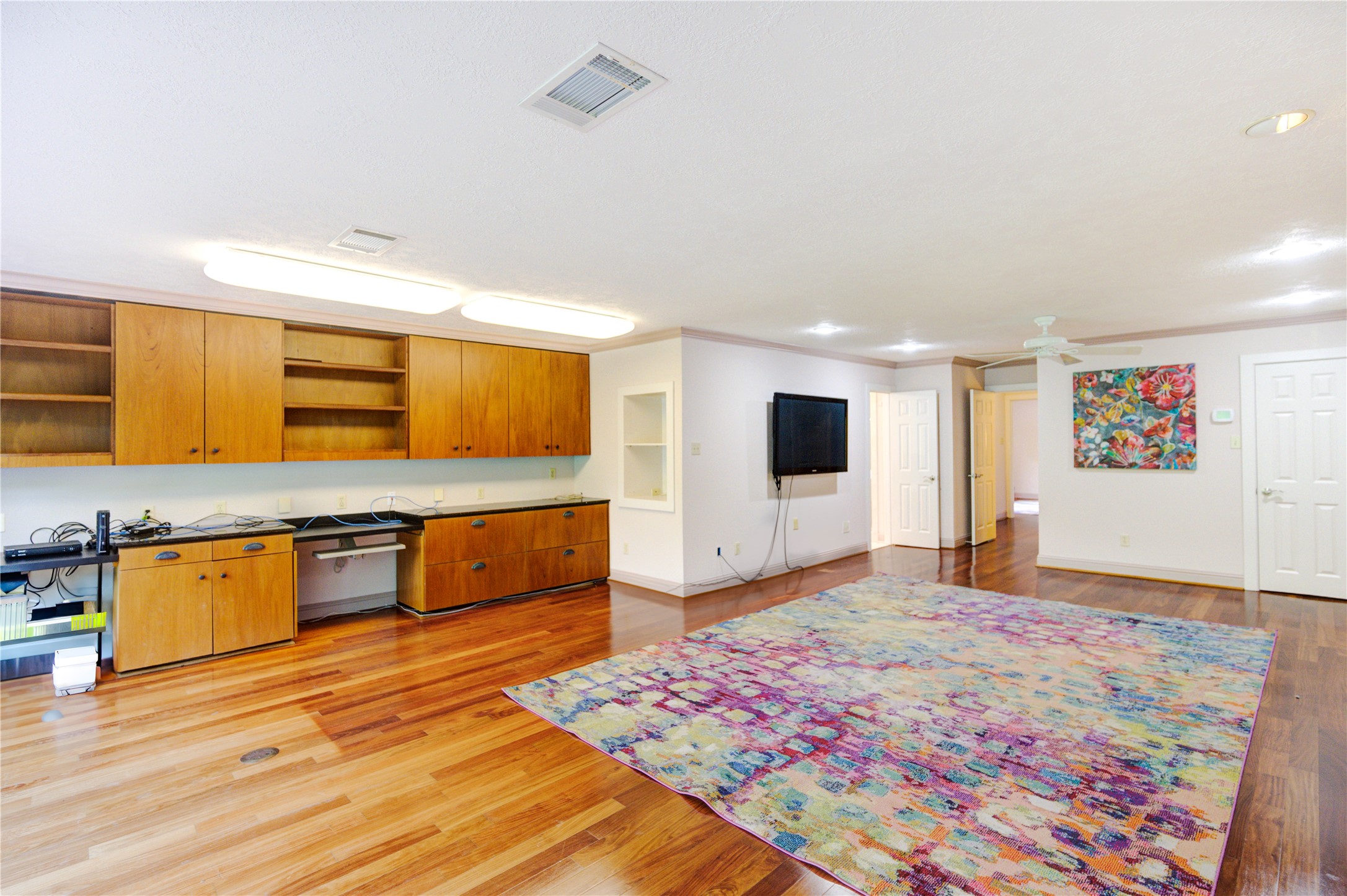 6 Gessner Road Houston, TX 77024 - Photo 32 of 49 a living room with stainless steel appliances kitchen island granite countertop furniture and a kitchen view