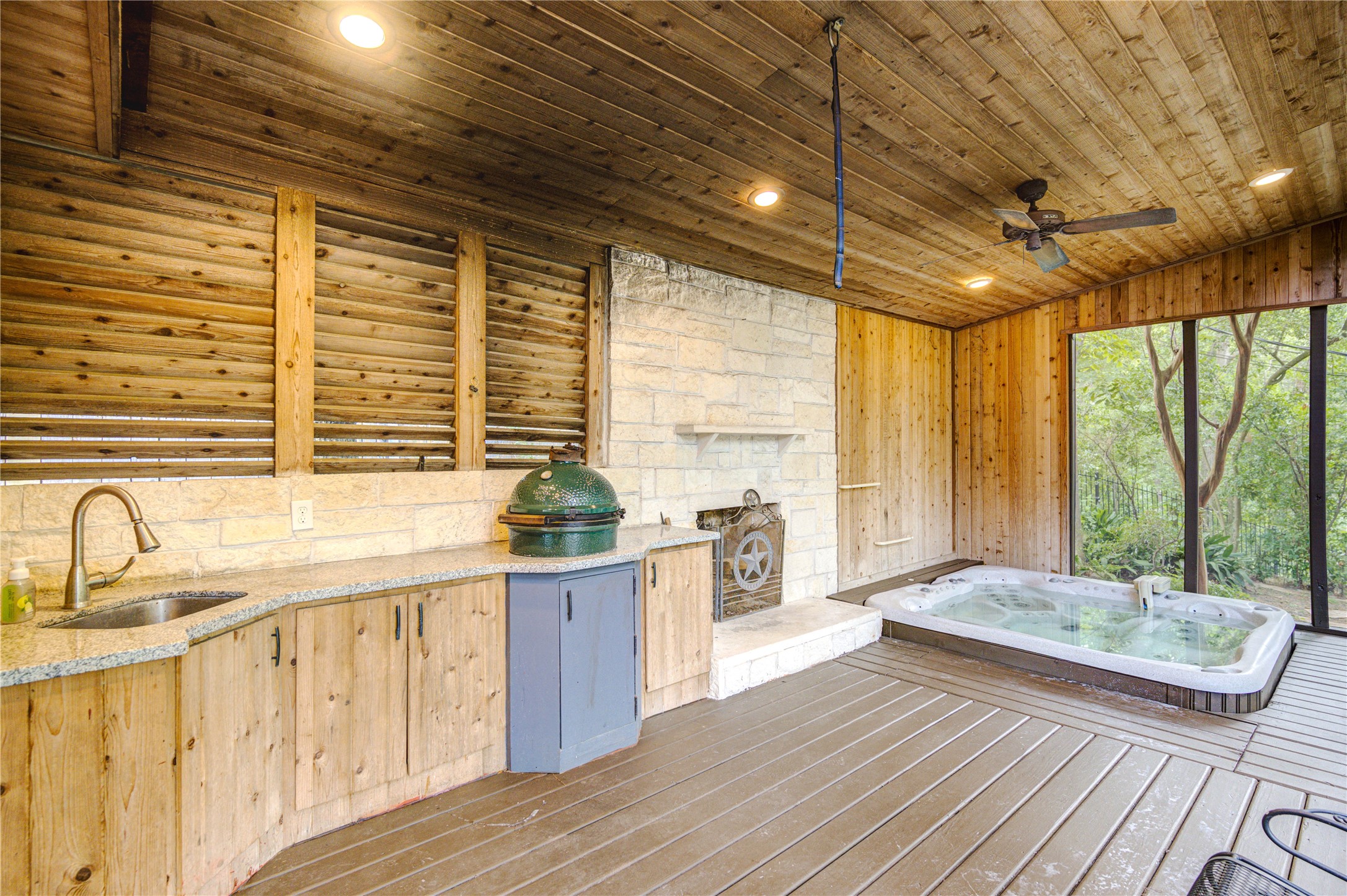 6 Gessner Road Houston, TX 77024 - Photo 36 of 49 If you are ready to relax this screened room with hot tub and cooker are ready for you.