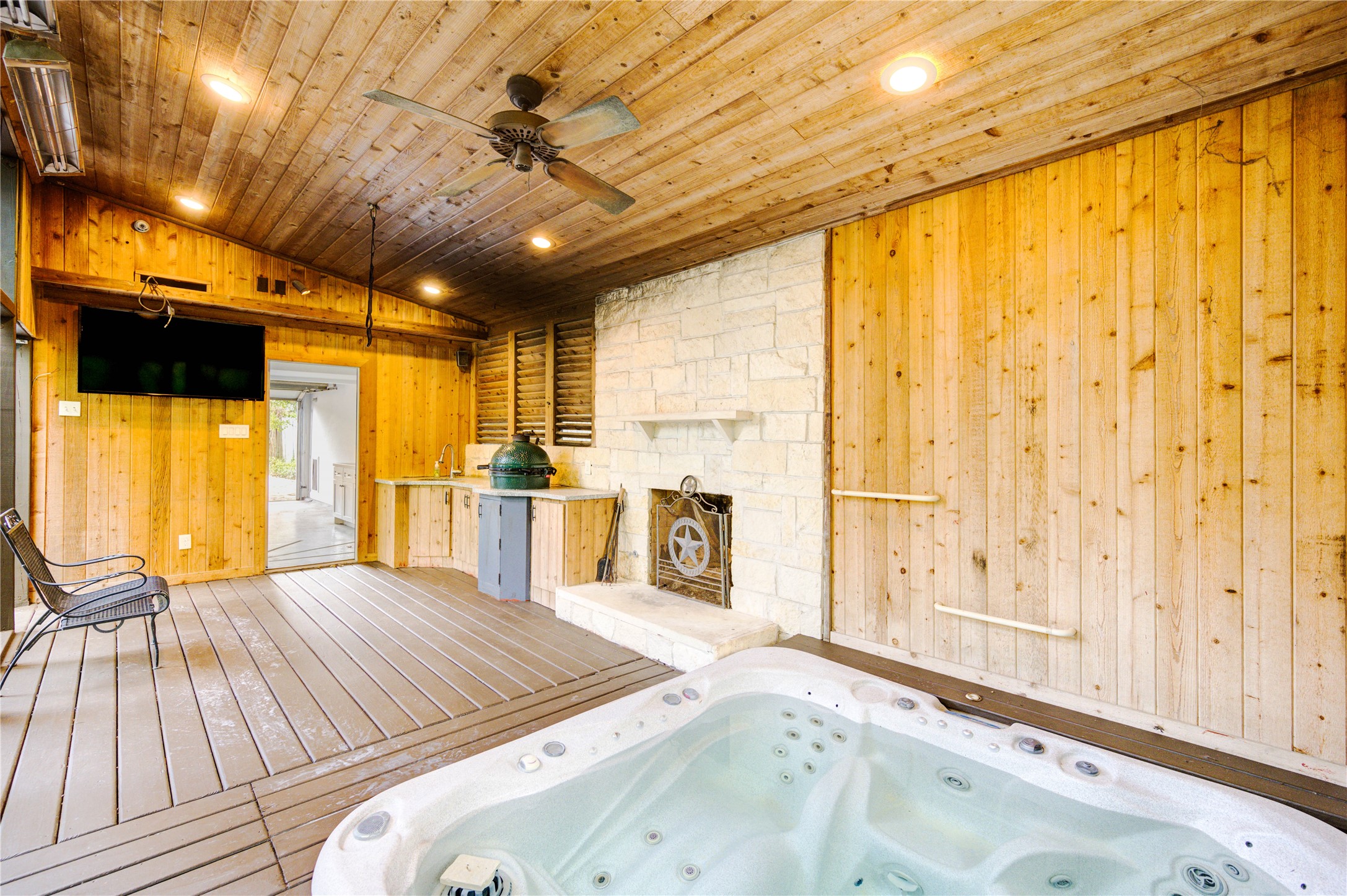 6 Gessner Road Houston, TX 77024 - Photo 38 of 49 a bedroom with a bed next to a window with the view of swimming pool