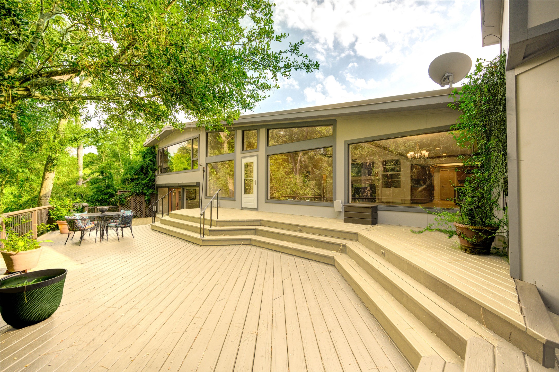 6 Gessner Road Houston, TX 77024 - Photo 41 of 49 a view of a swimming pool with a patio and a yard