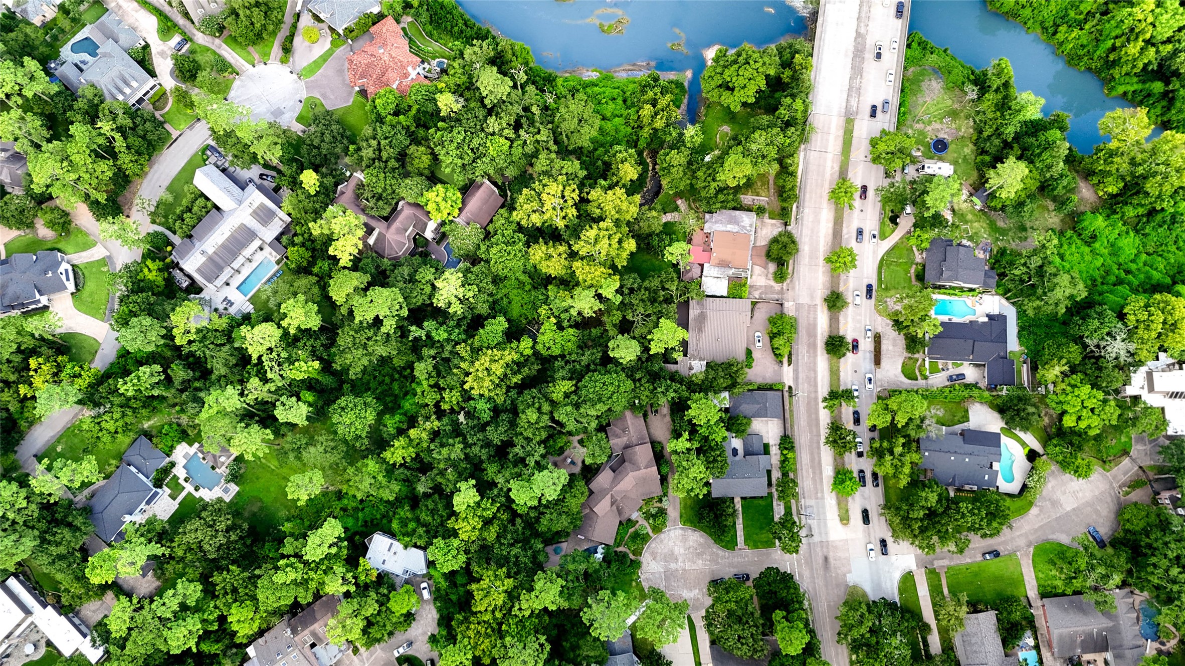 6 Gessner Road Houston, TX 77024 - Photo 45 of 49 Overview of the property and the creek.