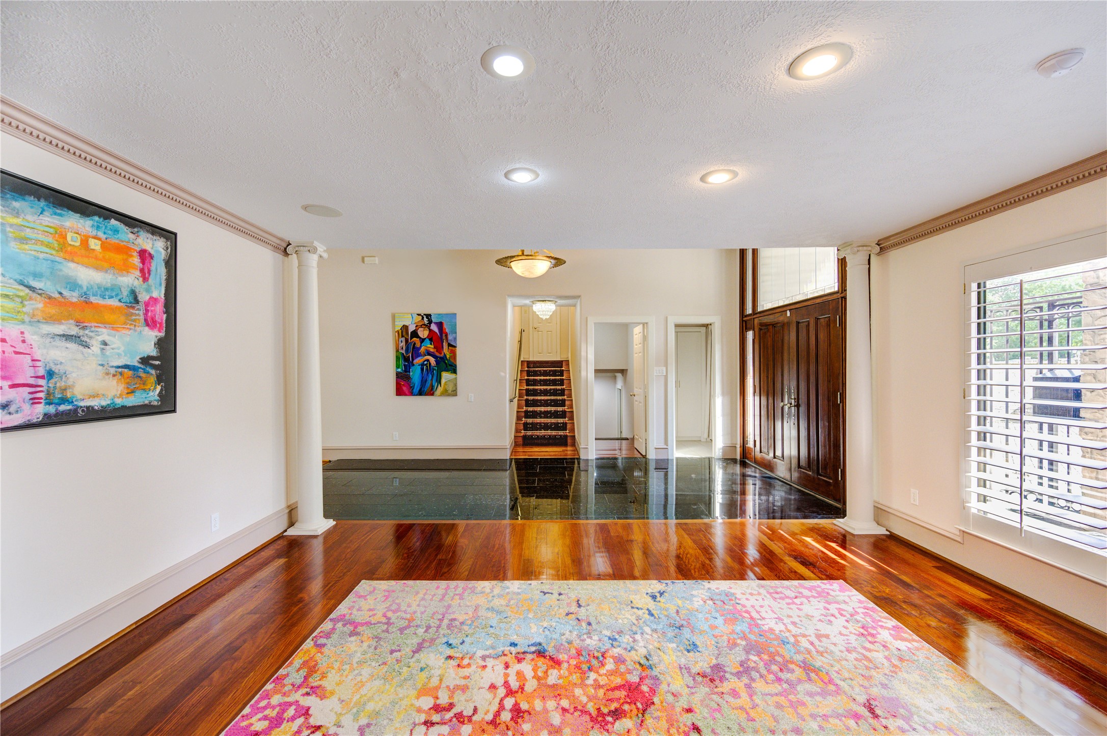 6 Gessner Road Houston, TX 77024 - Photo 8 of 49 Marble floors from the grace the entry hall.