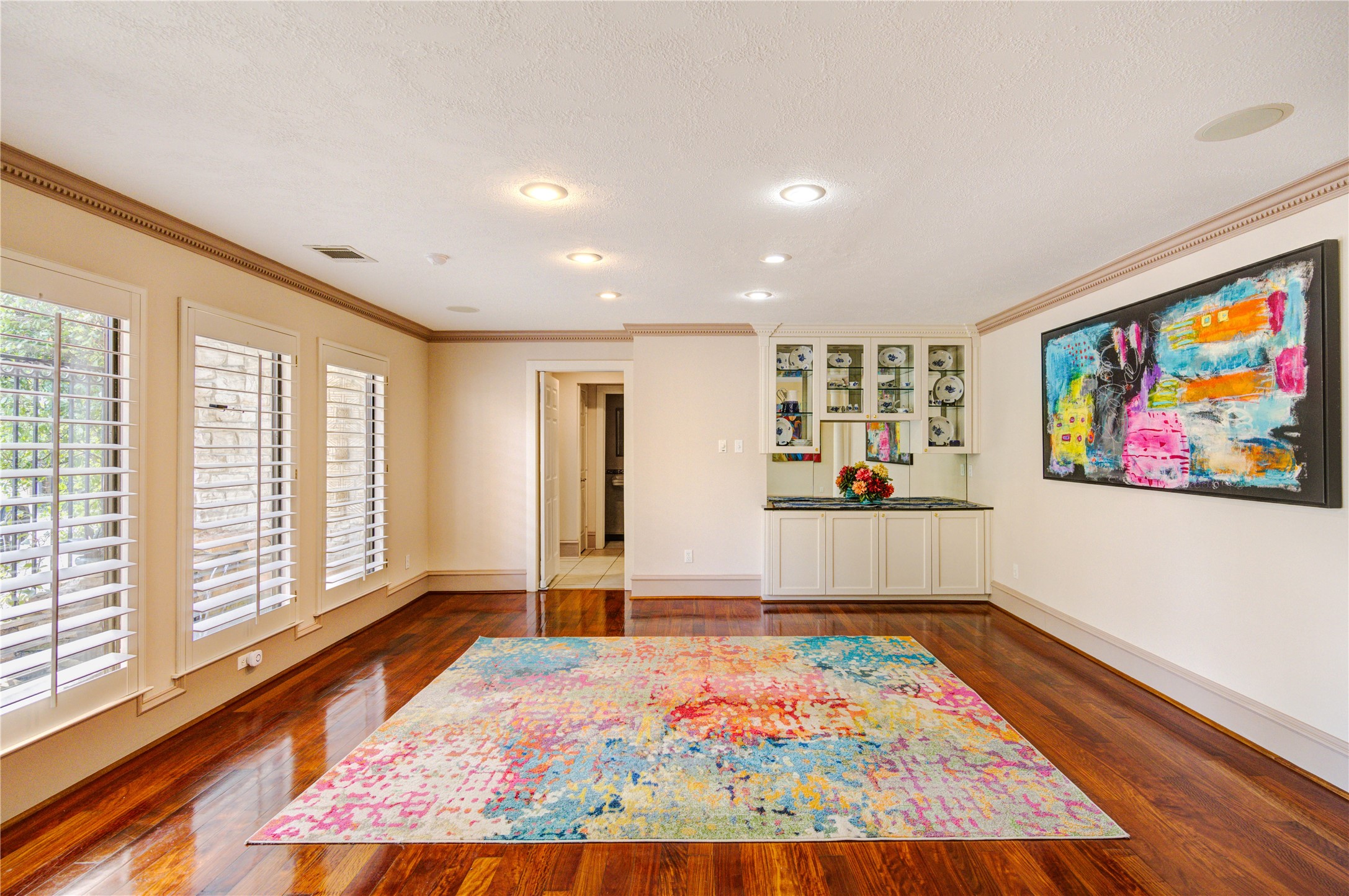 6 Gessner Road Houston, TX 77024 - Photo 9 of 49 Large dining room has a built in lighted hutch and is just off of the kitchen.