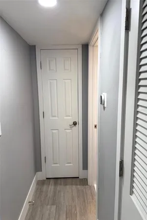 a view of room with hardwood floor