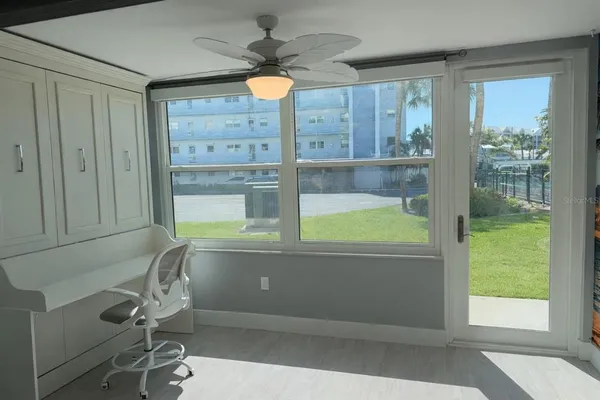 a room with a desk and chair