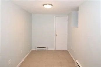 an empty room with a workbench